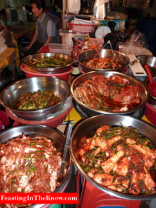 Korean market scene.  Kimchi stall.